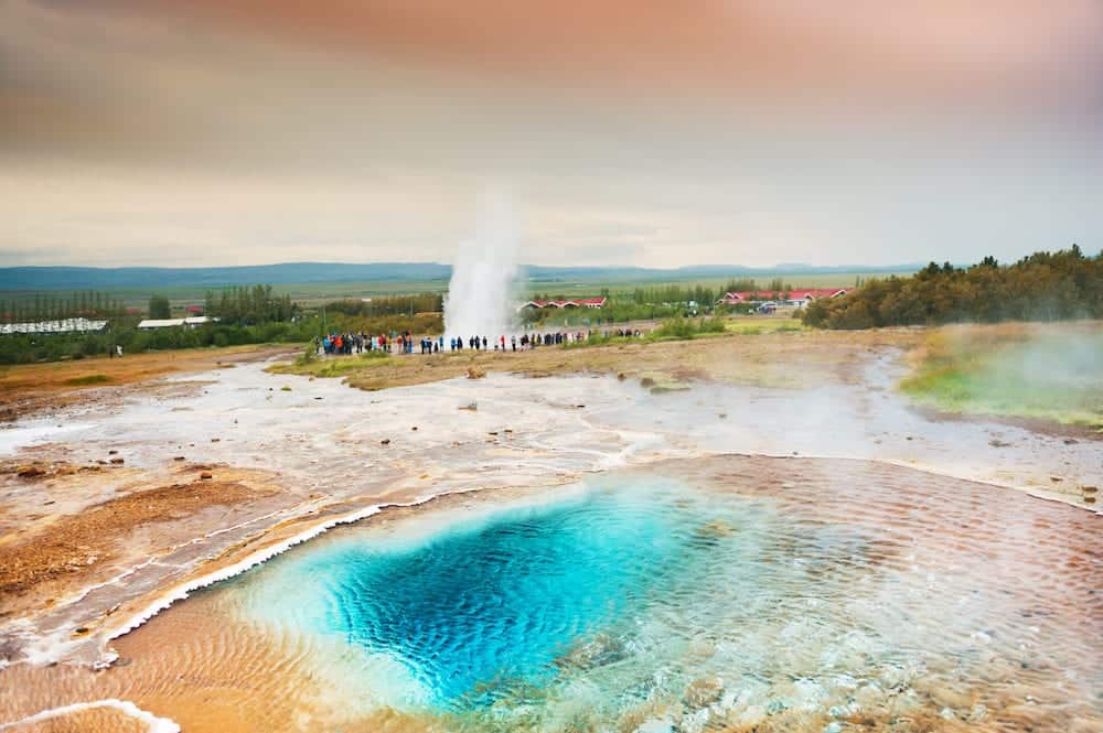 Thermal lake Blesi and eruption of Strokkur Geysir Golden circle route in Iceland