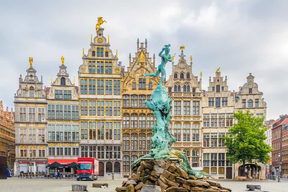 ANTWERP,BELGIUM - Brabo monument with Gildhouses at the Grote markt in Antwerp. Antwerp is a city in Belgium, and is the capital of Antwerp province in Flanders.