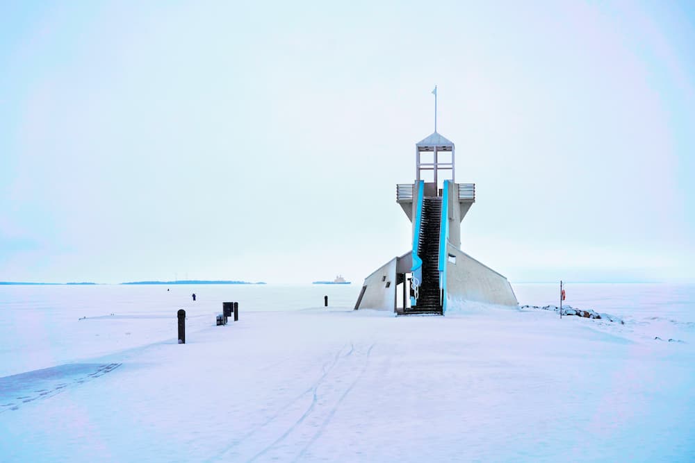 Lighthouse with staircase at the Baltic Sea in winter Oulu Lapland Finland.