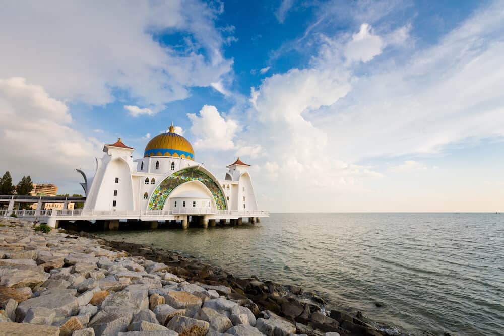 Beautiful architecture of Melaka Straits Mosque in Malacca city in Malaysia. Beautiful sacral building in south east Asia.