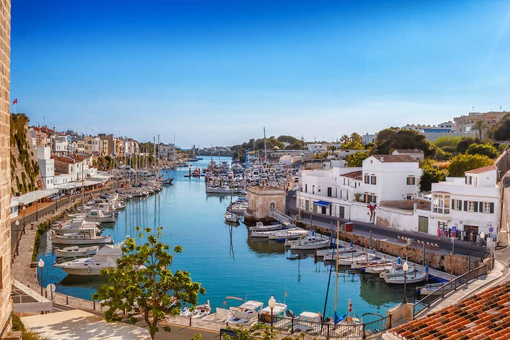 View on old town Ciutadella sea port on sunny day, Menorca island, Balears, Spain.